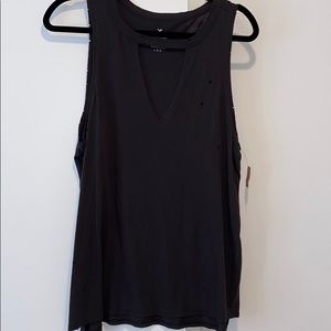 Distressed cut out V neck tank top. Size L